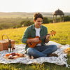 21-inch soprano mahogany ukulele set with adjustable strap, perfect for outdoor music enjoyment and beginner players.