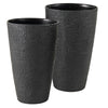 Set of 2 black 21-inch tall round plastic planters with drainage holes, ideal for indoor and outdoor plant arrangements.
