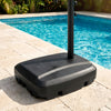 Heavy-duty black cantilever umbrella base stand with wheels, designed for 220 lbs weight capacity, ideal for patio use.