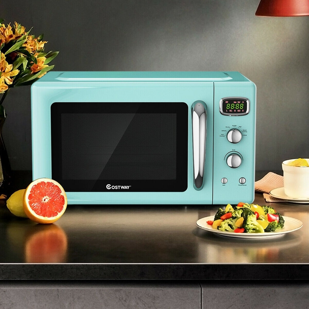 Retro green countertop microwave oven with 0.9 cu.ft capacity, featuring a clear viewing window and simple controls.