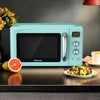 Retro green countertop microwave oven with 0.9 cu.ft capacity, featuring a clear viewing window and simple controls.