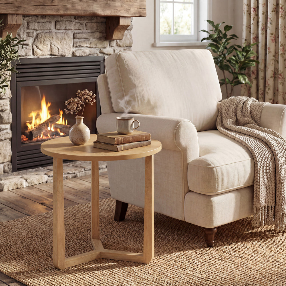 Round side table with a smooth, splinter-free surface and sturdy rubber wood legs, ideal for accenting cozy living.