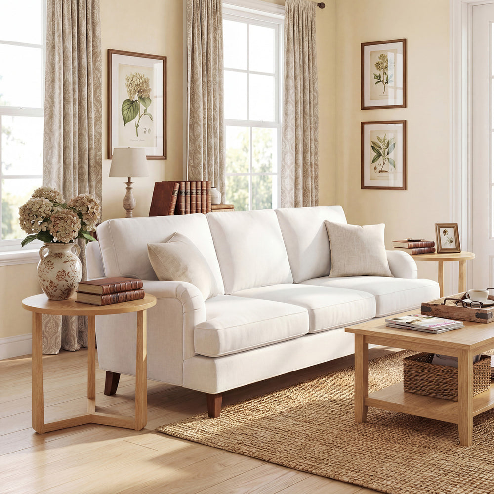 Natural-finish round side table with a triangular design and rubber wood legs, ideal for bedside or living room use.