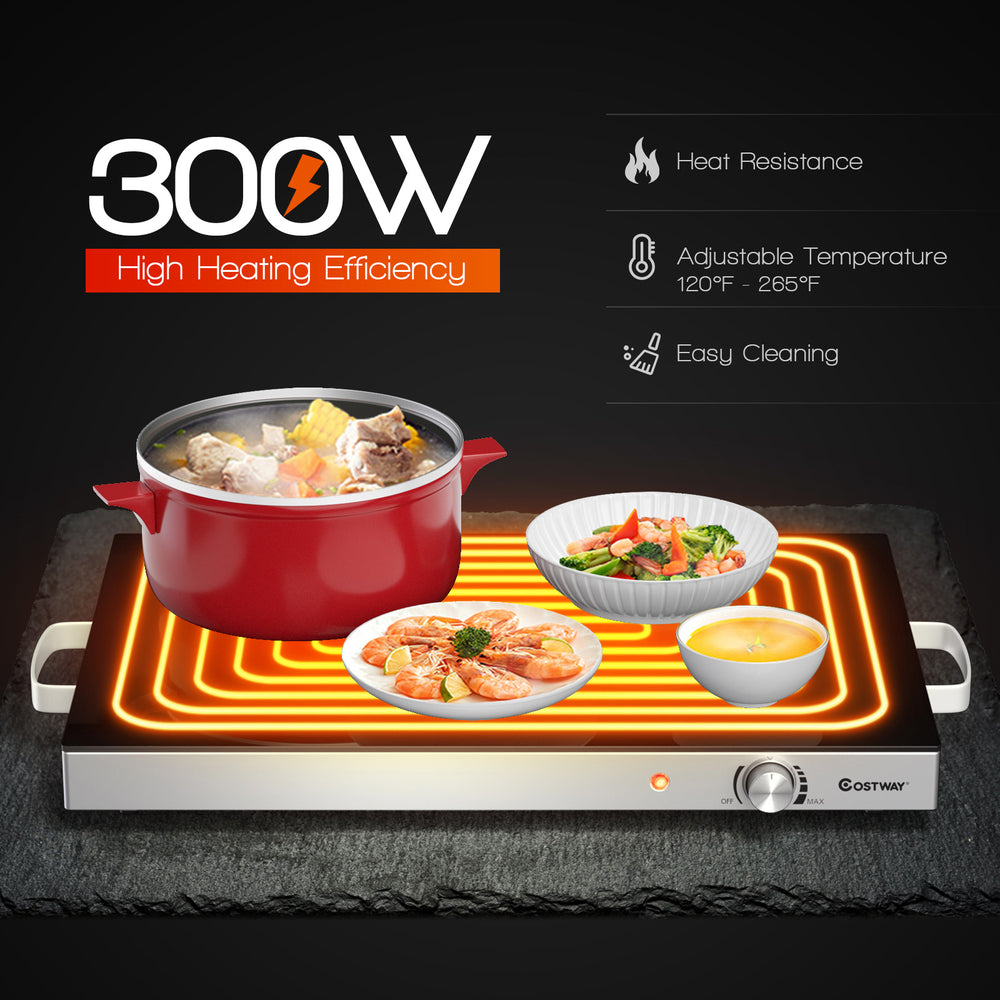 Electric warming tray with a spacious glass top, adjustable temperature, and stainless steel finish, perfect for.