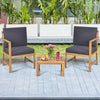 Two acacia wood chairs with thick cushions and a coffee table, perfect for outdoor relaxation in your backyard or patio.