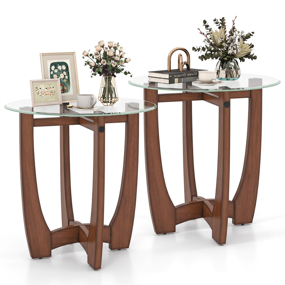 Set of 2 round end side tables with walnut wood frame and tempered glass tops, perfect for drinks and decorations.