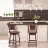Two 24.5-inch bar stools with rattan back and swivel seat, perfect for kitchen or dining room use.