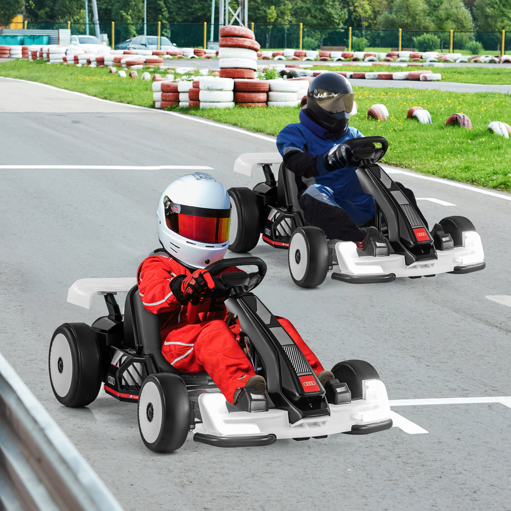 Kids racing in the 24V Audi go-kart, featuring adjustable length, powerful motors, and LED lights for thrilling play.