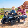 Black 24V ride-on dump truck with remote control, featuring premium multi-terrain wheels and LED headlights for kids.