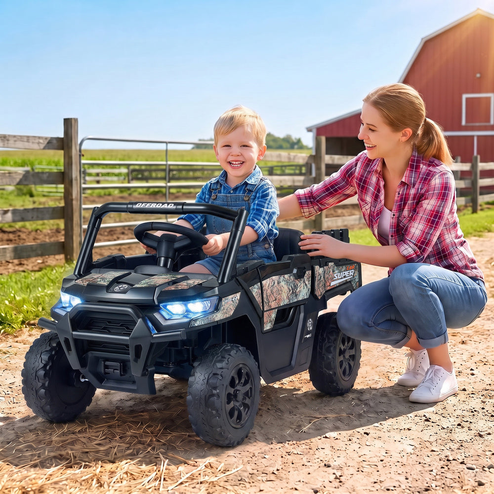 Black 24V ride-on dump truck with remote control, featuring premium multi-terrain wheels and LED headlights for kids.