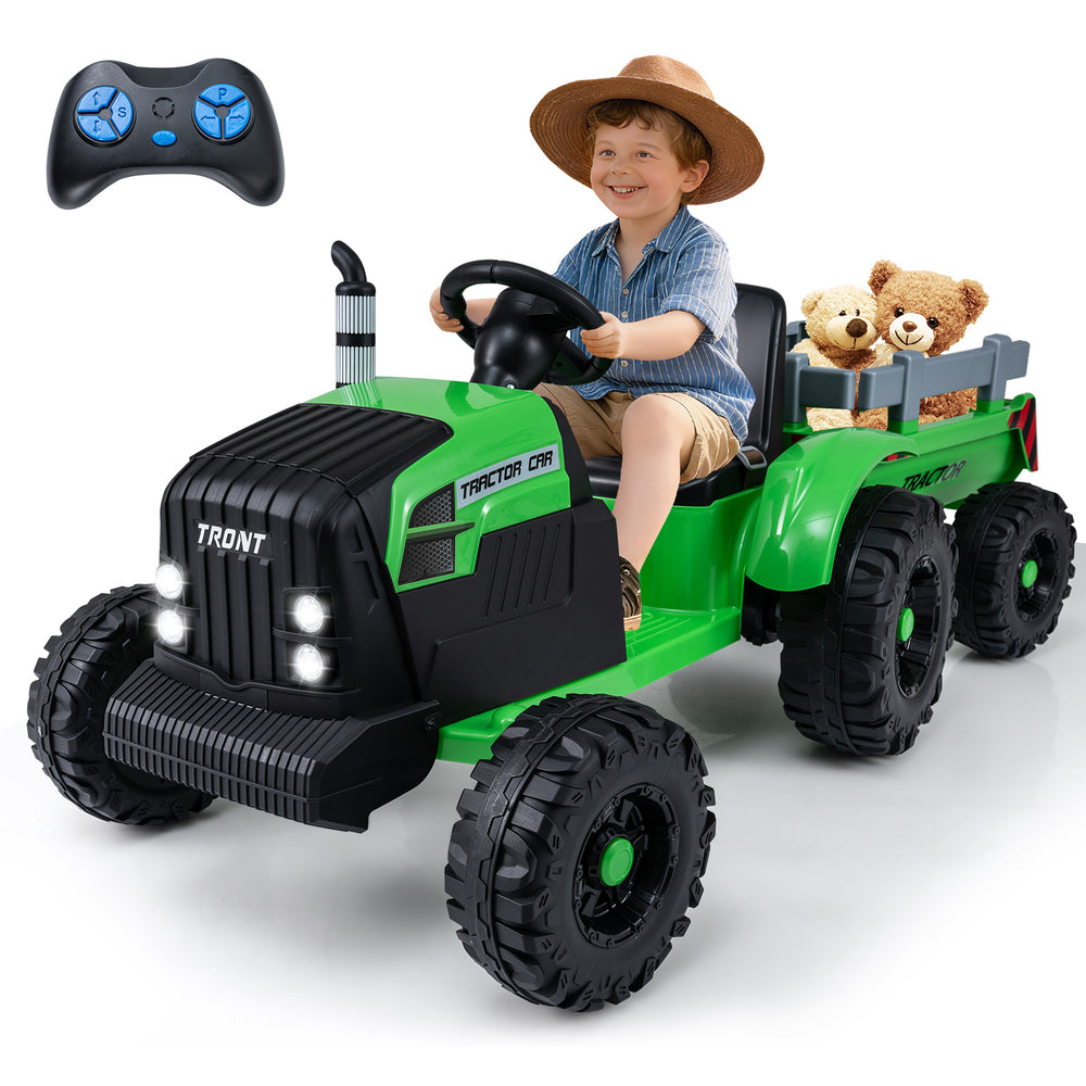 Kids electric ride-on tractor in green with detachable trailer, remote control, and LED headlights for outdoor fun.