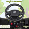 Steering wheel of the 24V Ride on Tractor featuring music controls, horn, and accelerator pedal for kids' fun.