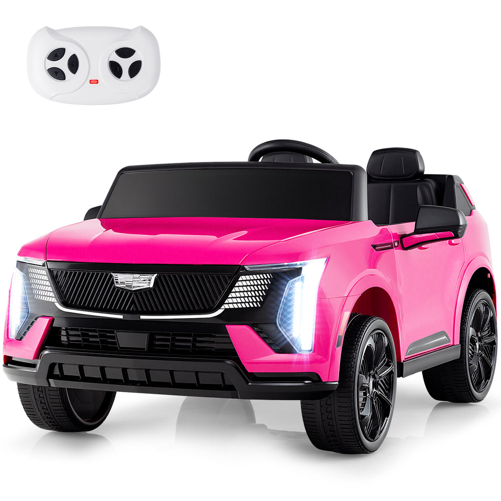 Pink 24V licensed Cadillac ride-on truck for kids, showcasing the stylish dashboard with joystick and entertainment.