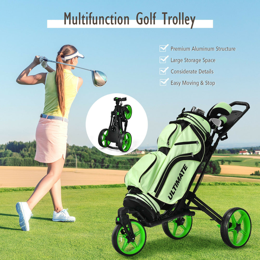 Folding golf push cart in green with adjustable handle, swivel wheels, and scoreboard holder for easy course navigation.