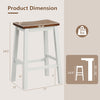 24.5-inch saddle stool with a walnut seat and gray legs, featuring ergonomic design and footrests for kitchen islands.