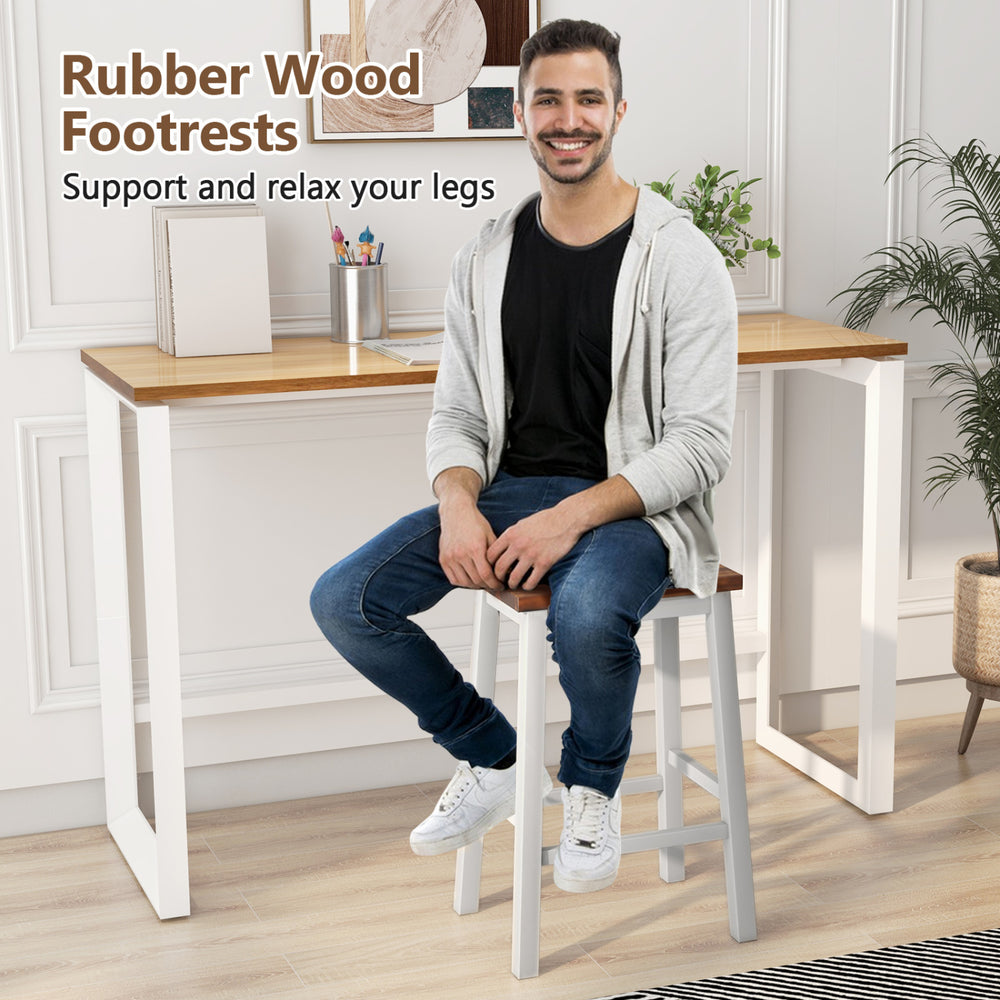Saddle stool with rubber wood footrests and wide acacia wood seat, perfect for kitchen islands and dining areas.