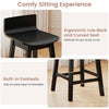 Ergonomic low back and curved seat of a black swivel wooden bar stool, designed for comfort and relaxation.