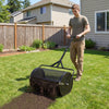24-inch compost spreader with height-adjustable T-shaped handle, perfect for efficient lawn and garden topdressing.
