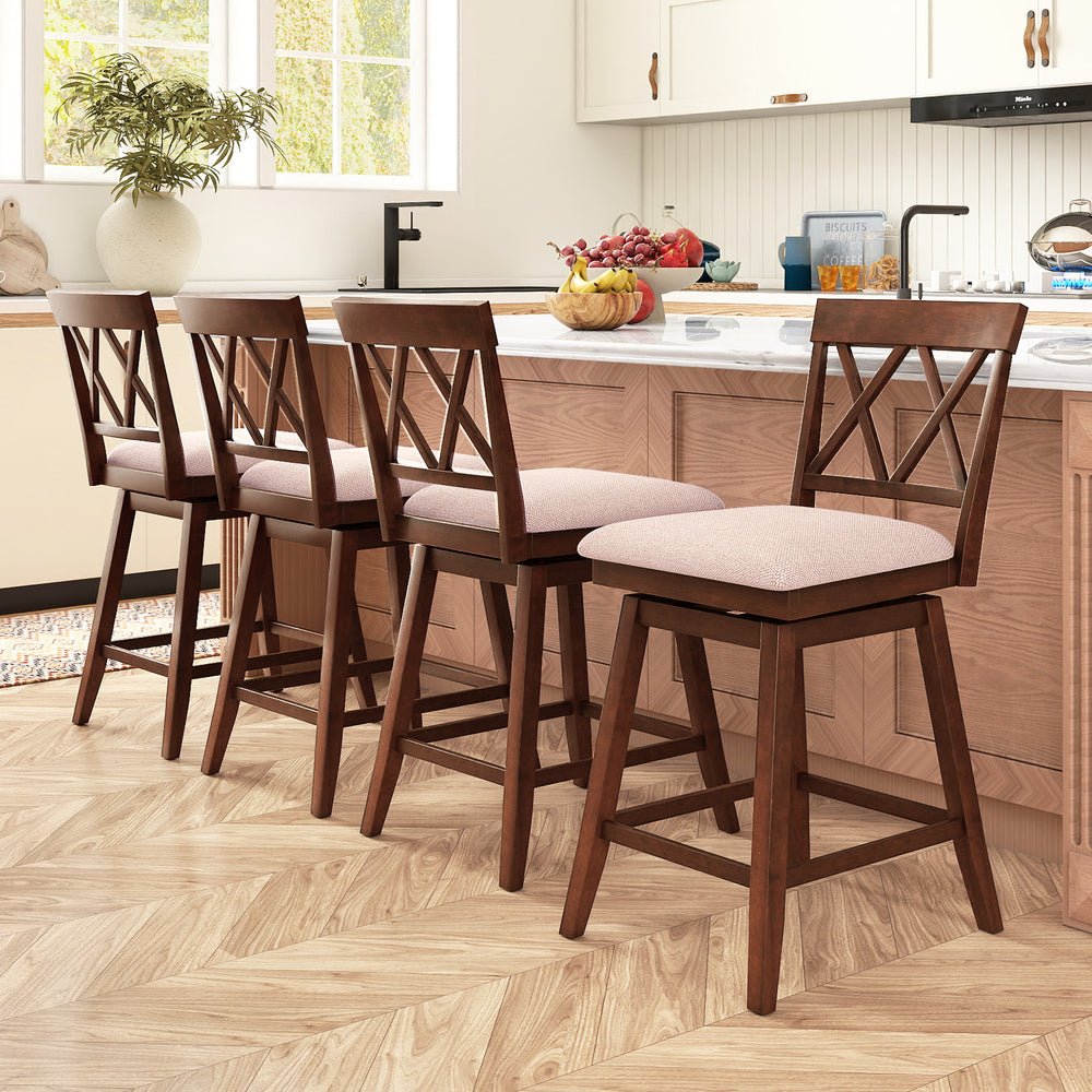 Set of four 24-inch oak counter height barstools with backrest and upholstered seat cushions for kitchen dining.