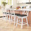 Set of four 24-inch white counter height barstools with upholstered seat cushions, ideal for kitchen or dining room use.