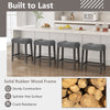Set of 2 gray saddle bar stools with padded seats, solid rubber wood frame, and ergonomic design for comfort.
