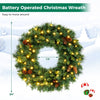 Pre-lit 24" Christmas wreath with 50 warm white LED lights, pine cones, and lush green branches for festive decor.