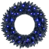 24-inch pre-lit Halloween wreath featuring 35 purple LED lights, perfect for adding a spooky touch to your decorations.