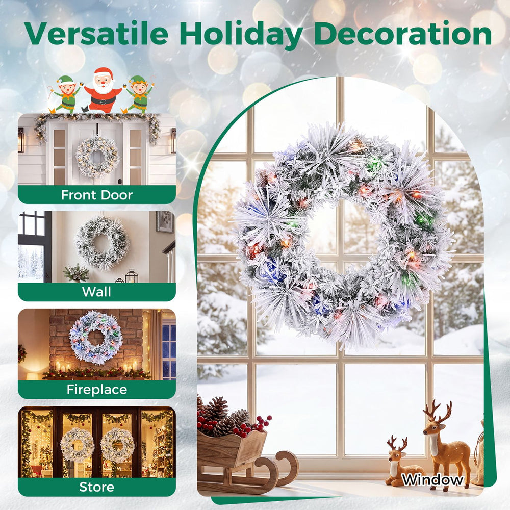 Pre-lit Christmas wreath with 106 frosted branch tips and 35 color-changing LED lights displayed in a snowy window.