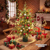 24" pre-lit tabletop Christmas tree showcasing a rotating musical base and adorned with festive decorations and lights.
