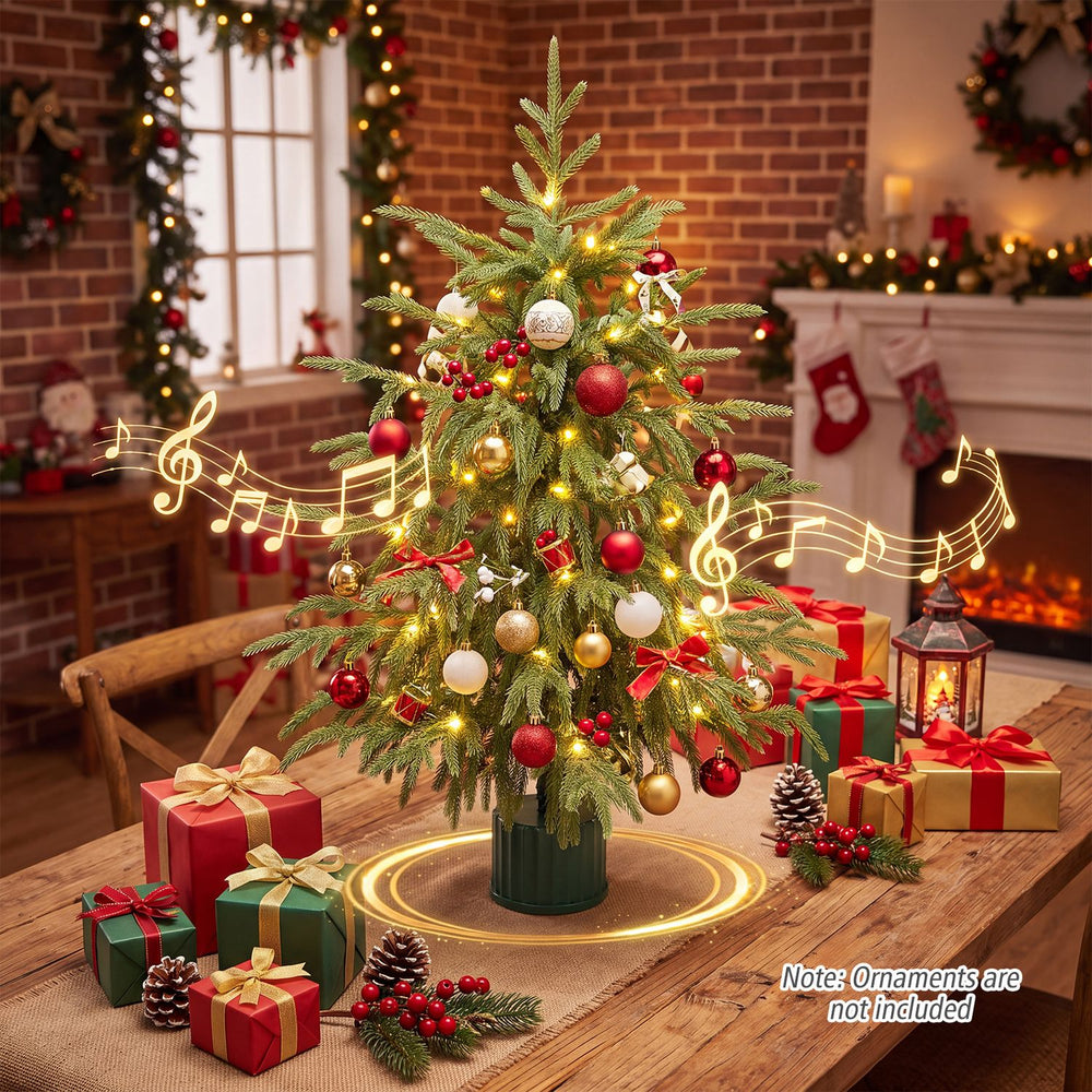 24" pre-lit tabletop Christmas tree showcasing a rotating musical base and adorned with festive decorations and lights.