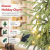 24" pre-lit tabletop Christmas tree with 45 lifelike branch tips and rotating musical base for festive holiday decor.
