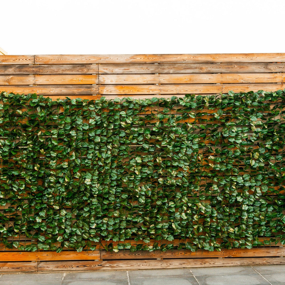 Faux ivy leaf decorative privacy fence, 40 x 95 inches, ideal for indoor/outdoor use, providing lush green coverage.