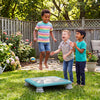 Kids joyfully jumping on a 25.5" mini trampoline with non-slip foot pads, perfect for indoor and outdoor play.
