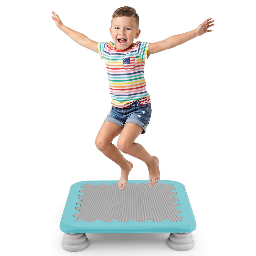 A child jumps on a 25.5" mini trampoline with non-slip foot pads, perfect for indoor and outdoor play.