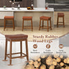 Upholstered PU leather bar stool with saddle seat, sturdy rubber wood legs, ideal for dining room or kitchen use.