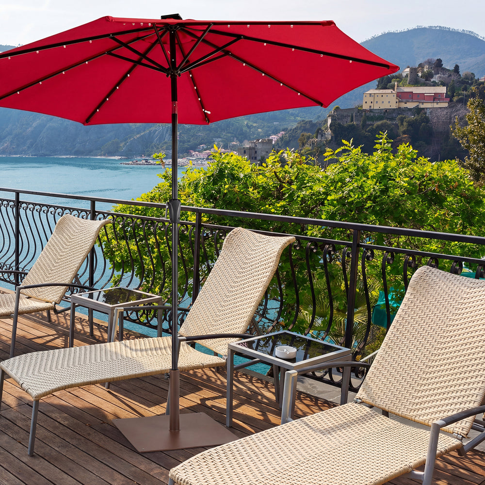 25-inch square patio umbrella base in brown, 42 lbs, designed for stability on uneven ground, ideal for outdoor use.