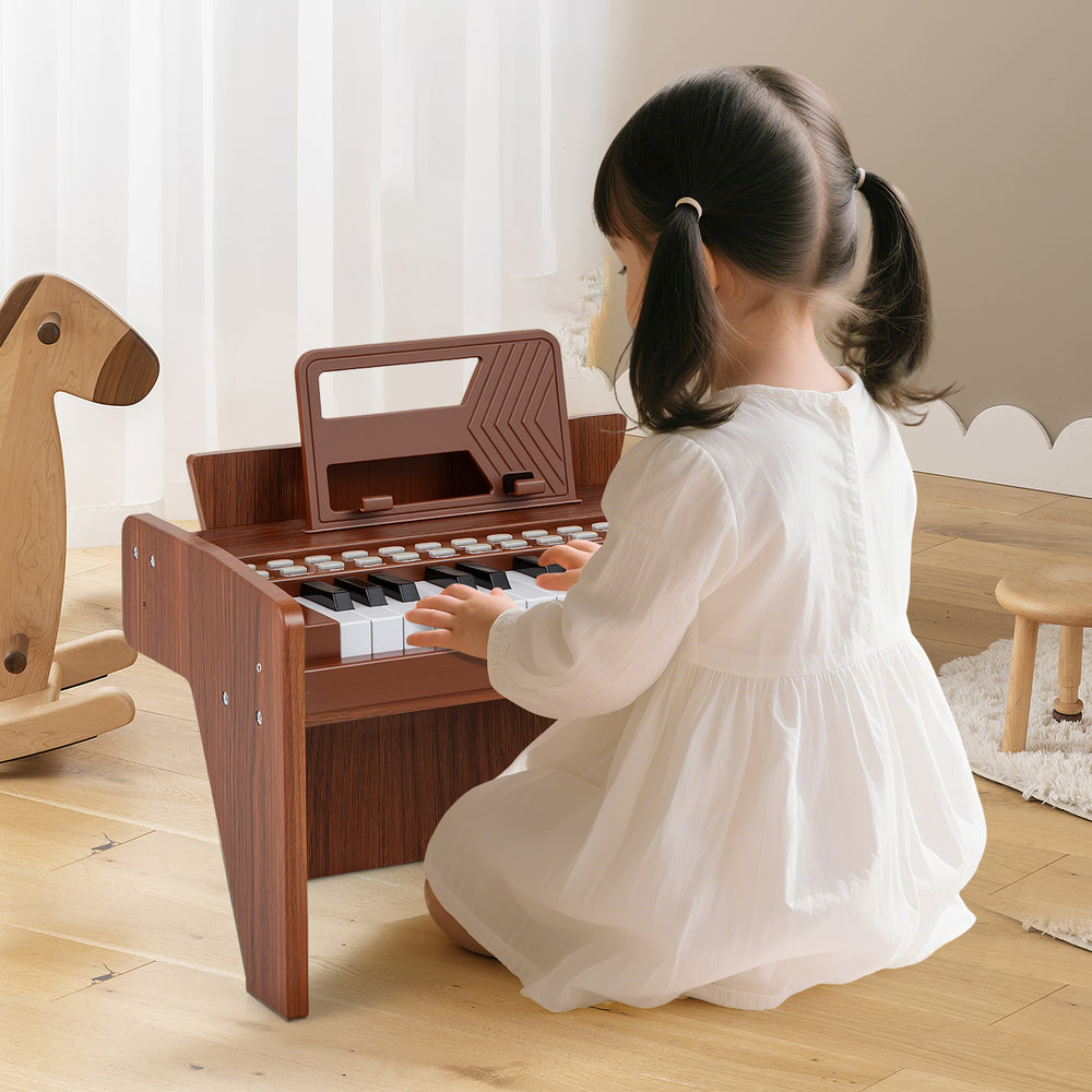 25-key kids piano keyboard in brown, featuring adjustable speed and volume, perfect for toddlers' musical play.
