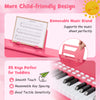 25-key pink kids piano keyboard with removable music stand, designed for toddlers' safe and enjoyable play.