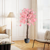 5.5 FT tall artificial cherry blossom tree with pink flowers, featuring a natural wood trunk, perfect for home decor.