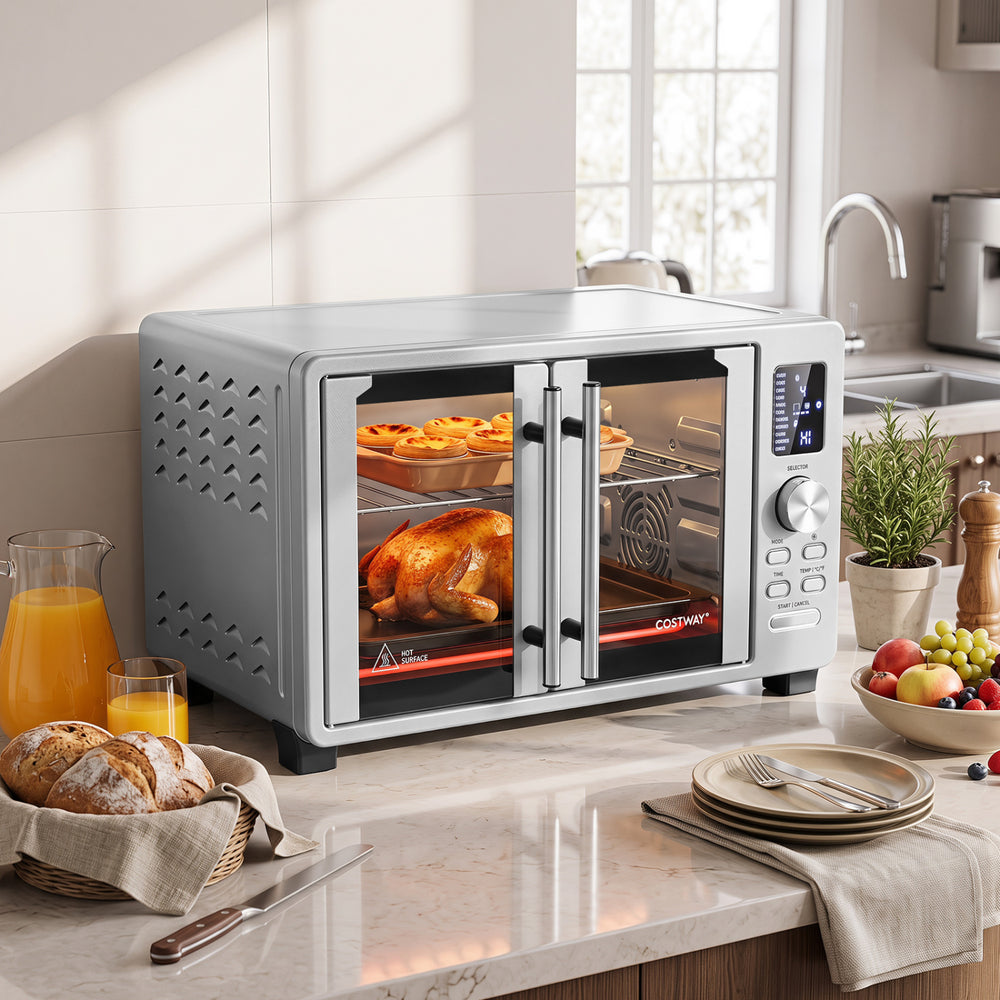 French door convection toaster oven with 26.4 qt capacity, 11 presets, and easy-to-read LED display for convenient cooking.
