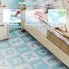 Interlocking ABC play mats in blue with detachable letters, 0.4" thick EVA foam for safe, cushioned play.