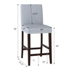 Counter height chair with padded seat and backrest, gray fabric, and nailhead trim, ideal for kitchen or bar use.