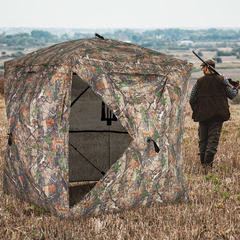 270° see-through hunting blind tent with silent magnetic door, designed for stealth and easy setup in the wilderness.