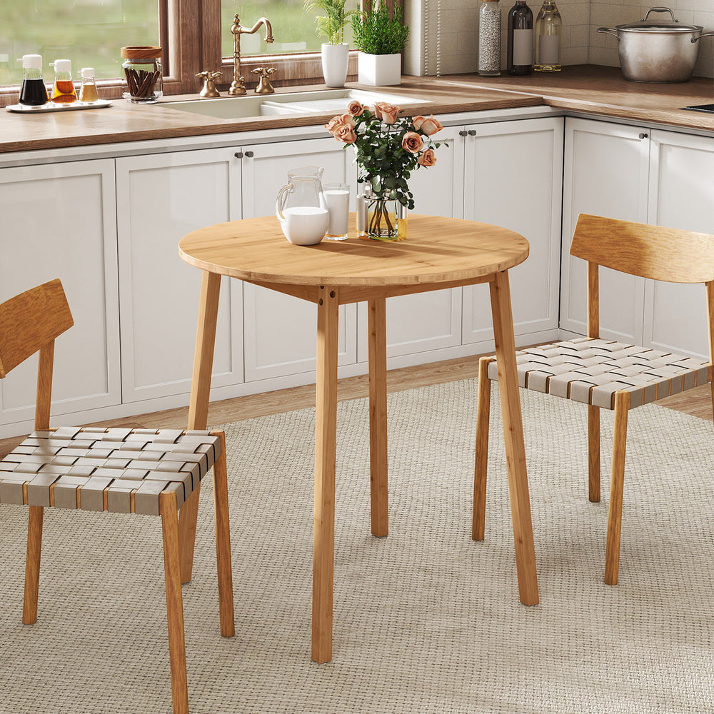 Round bamboo dining table for 2-4 people with smooth corners, ideal for small spaces in kitchens or dining areas.