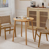 Round bamboo dining table for 2-4 people with smooth corners, ideal for small spaces in kitchens or living rooms.