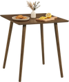 Small square walnut dining table for 2-4 people with rounded corners and solid rubber wood legs, ideal for compact spaces.