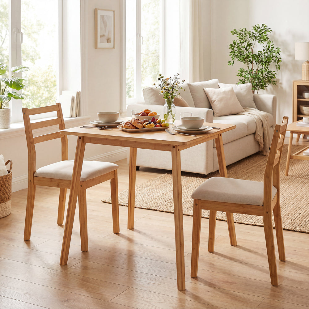 Square bamboo dining table for 2-4 people with a natural finish, ideal for compact spaces and versatile use.