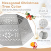 Hexagonal silver Christmas tree collar features delicate hollow patterns and interlocking joints for a stylish holiday display.
