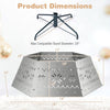 28-inch silver metal hexagonal Christmas tree collar features hollowed-out artistry, fitting stands up to 24 inches in diameter.