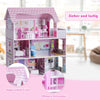 Detail view of the 28-inch pink dollhouse showcasing rounded corners and an open cabinet door for safe, imaginative.